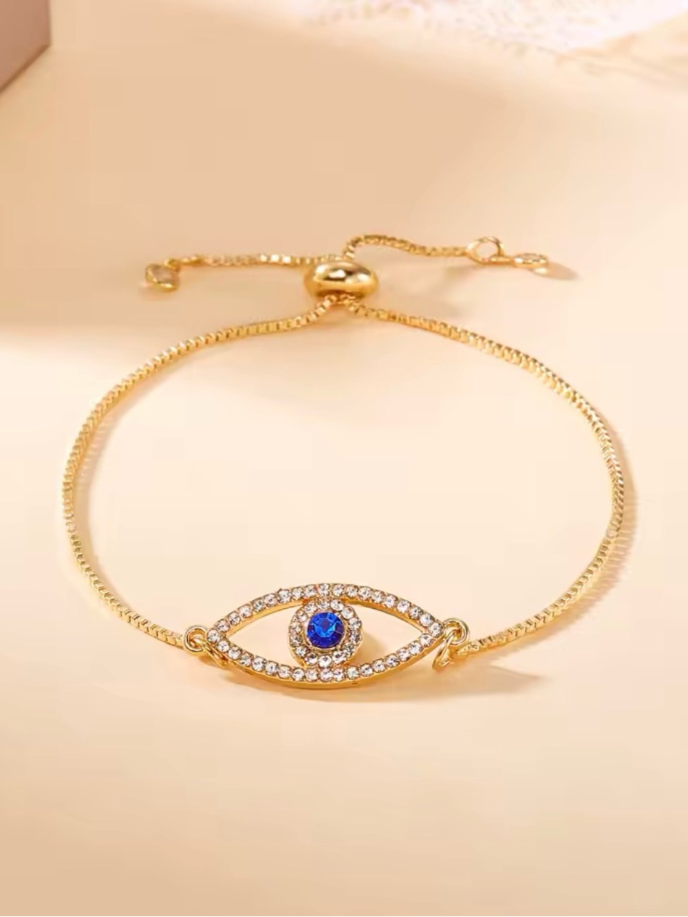 Gold Evil Eye Pendant Necklace with Blue Center